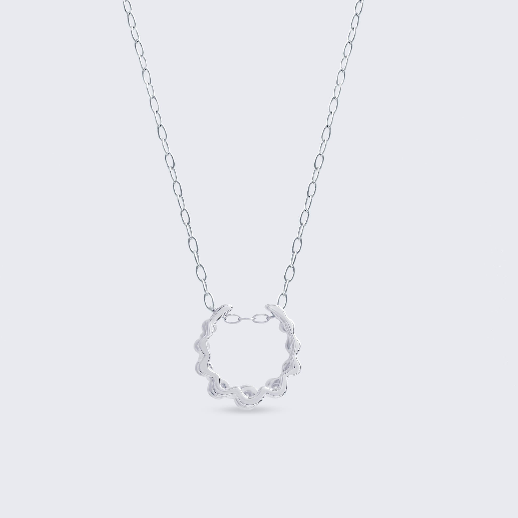 ホースシュー ダイヤモンドペンダント – K18WG、0.15カラット